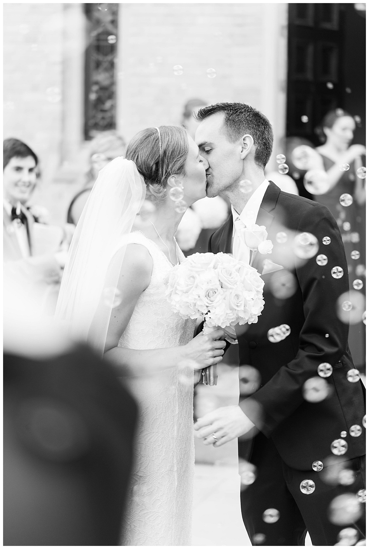 Virginia Museum of Fine Arts Wedding: bride and groom portrait, kissing, just married, bubble exit