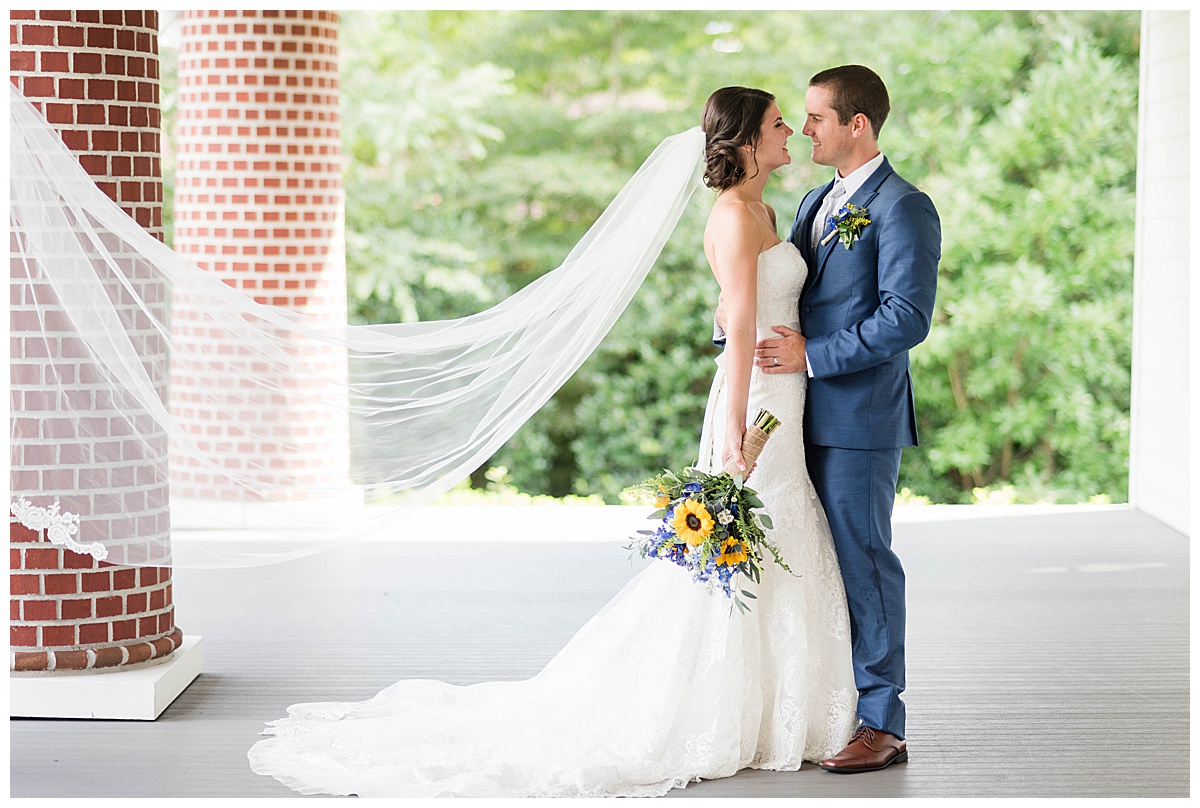 Woman's Club at Portsmouth Summer Wedding: bride and groom, veil, sunflower, bridal bouquet, blue suit