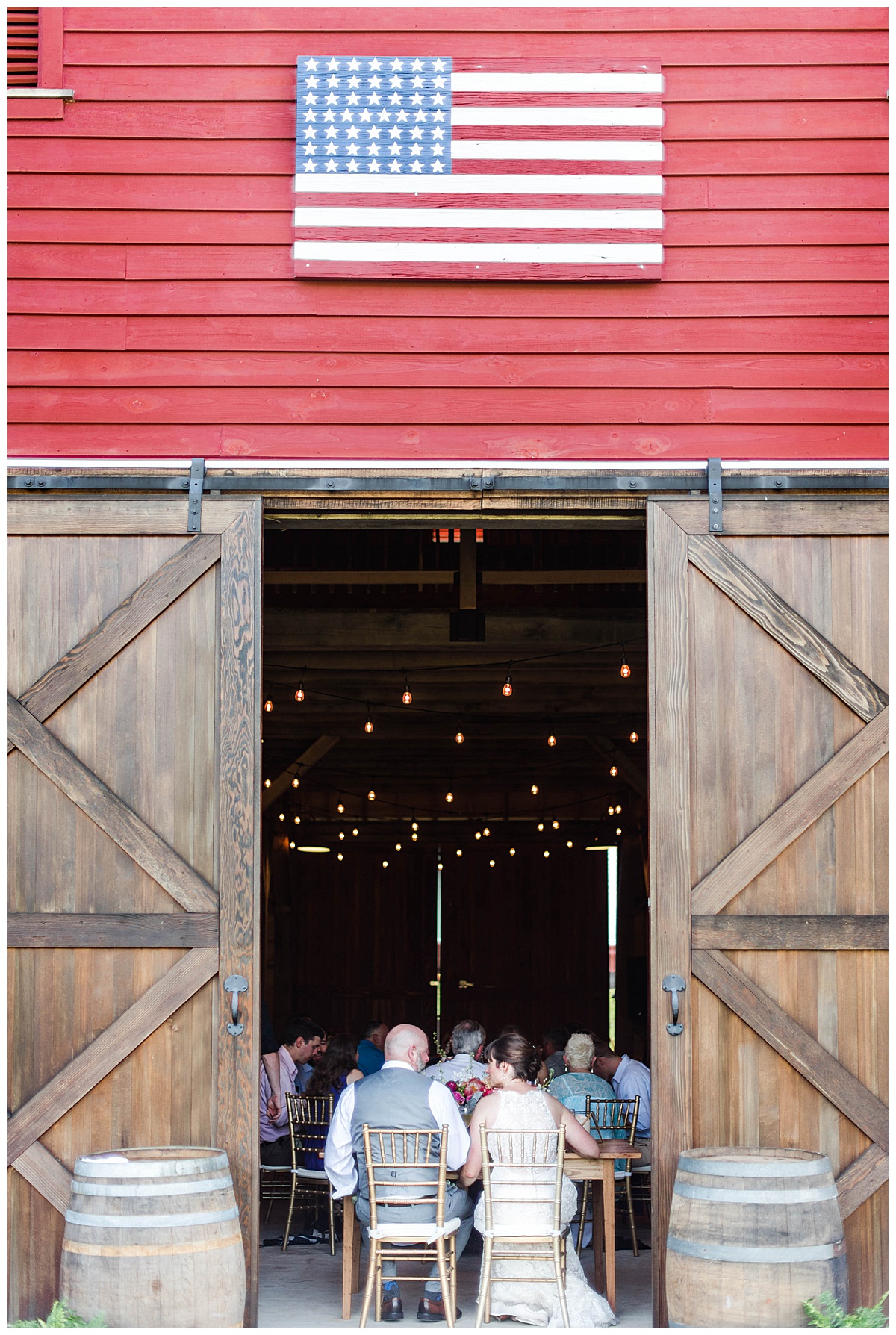 Rustic Charlottesville Farm Wedding: Wedding Reception, Flag Decor, Barn wedding venue, bride and groom, sweetheart table