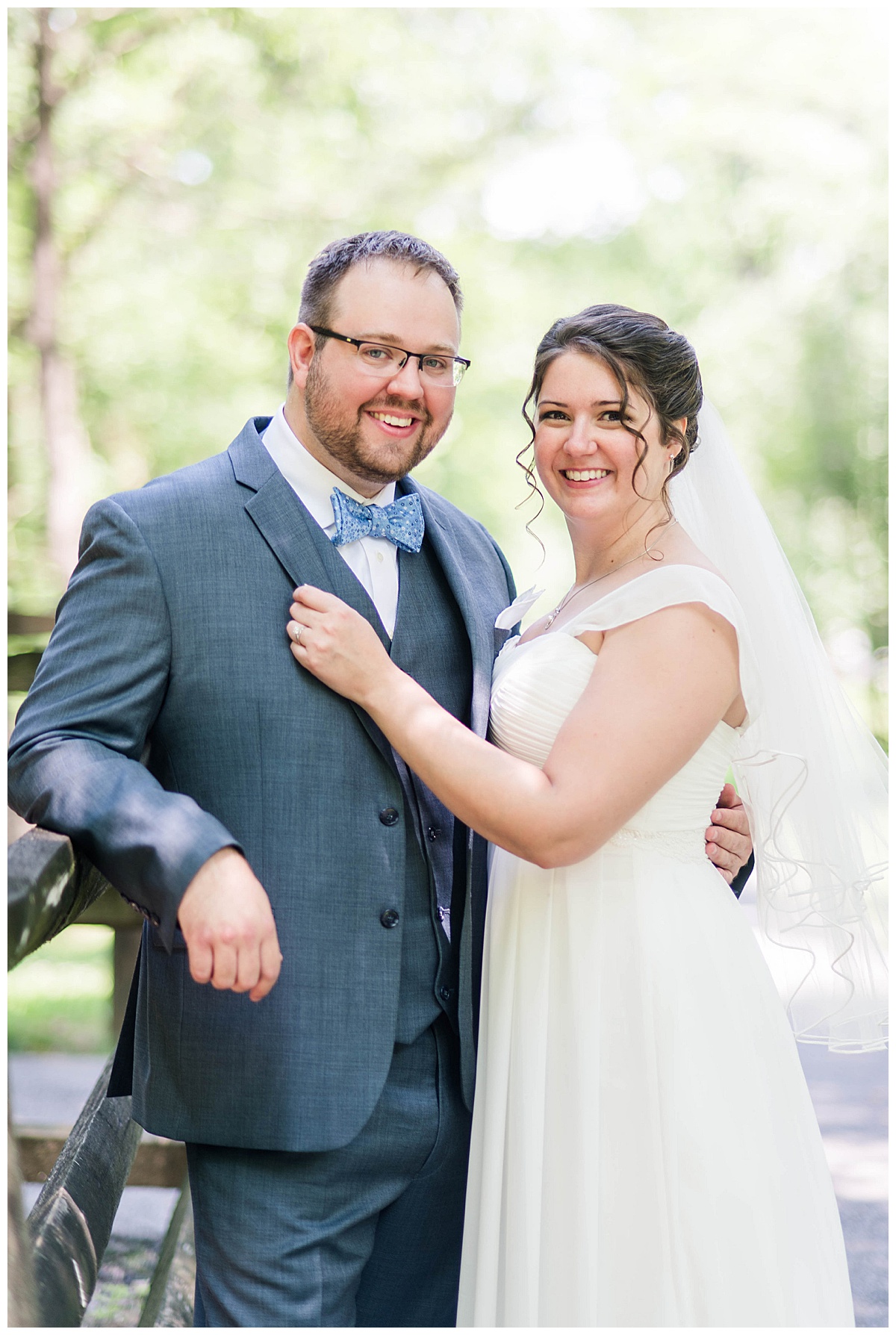 DC Church Wedding: bride and groom formal portrait, outdoors, veil, blue bowtie, blue suit, formal wear, sweetheart gowns wedding dress
