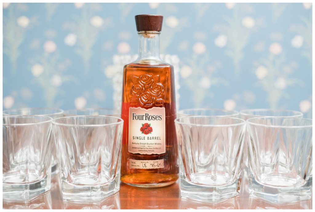 rustic vintage inspired wedding Charlottesville B & B fall Wedding four roses liquor and glasses