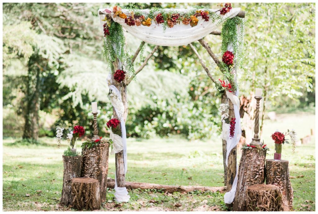 rustic vintage inspired wedding Charlottesville B & B fall Wedding vintage rustic wedding decor wooden arch with flowers boho vintage rustic inspired