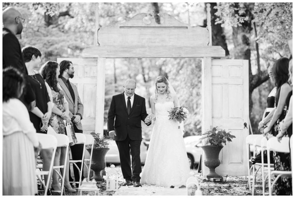 rustic vintage inspired wedding Charlottesville B & B fall Wedding vintage rustic wedding decor bride walking down aisle with father
