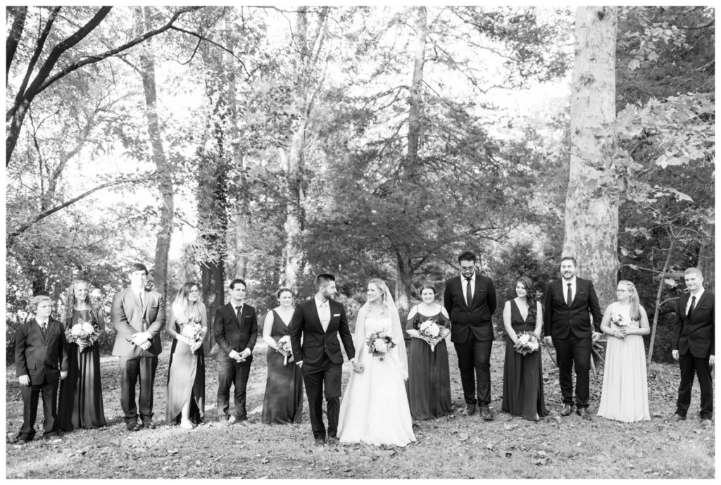 rustic vintage inspired wedding Charlottesville B & B fall Wedding  bride groom and wedding party photo outdoors walking