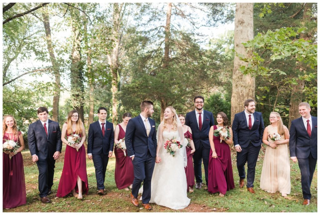 rustic vintage inspired wedding Charlottesville B & B fall Wedding  bride groom and wedding party photo outdoors  walking