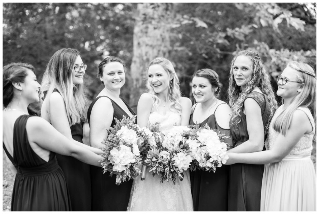 rustic vintage inspired wedding Charlottesville B & B fall Wedding bride and wedding party bridal party photo burgundy bridesmaid dresses laughing