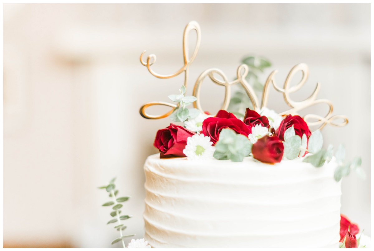 charlottesville cville virginia va wedding reception bed and breakfast gold metal love sign cake topper red wine burgundy flowers florals white wedding cake photo caterer