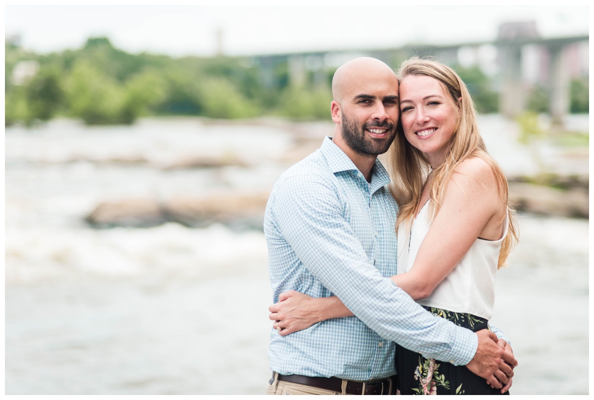 couple smiling. engagement photo inspo at belle isle richmond virginia by rva wedding and engagement photographer sarah & dave photography