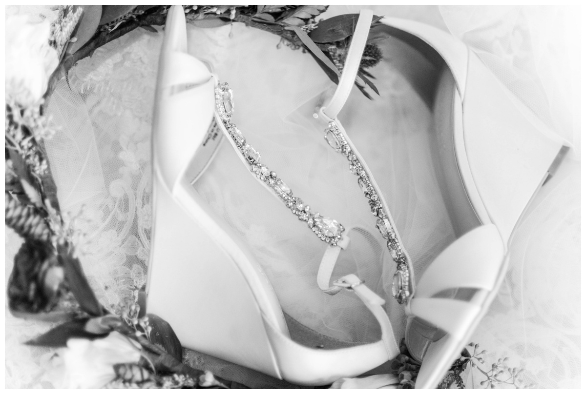 Whimsical Woodland Fall Wedding at mountain memories at thorpewood in thurmont maryland in october by sarah & dave photography richmond wedding photographer bridal shoes davids bridal white wedding shoes with jewels and wedge heel with flower crown black and white photo inspiration