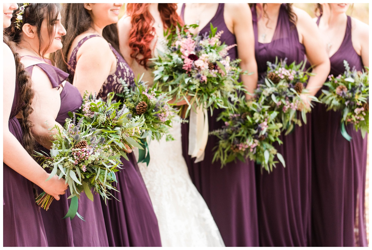 Whimsical Woodland Fall Wedding at mountain memories at thorpewood in thurmont maryland in october by sarah & dave photography richmond wedding photographer deep dark purple bridesmaid dresses holding bouquet wedding party photos with bride formal portrait ideas