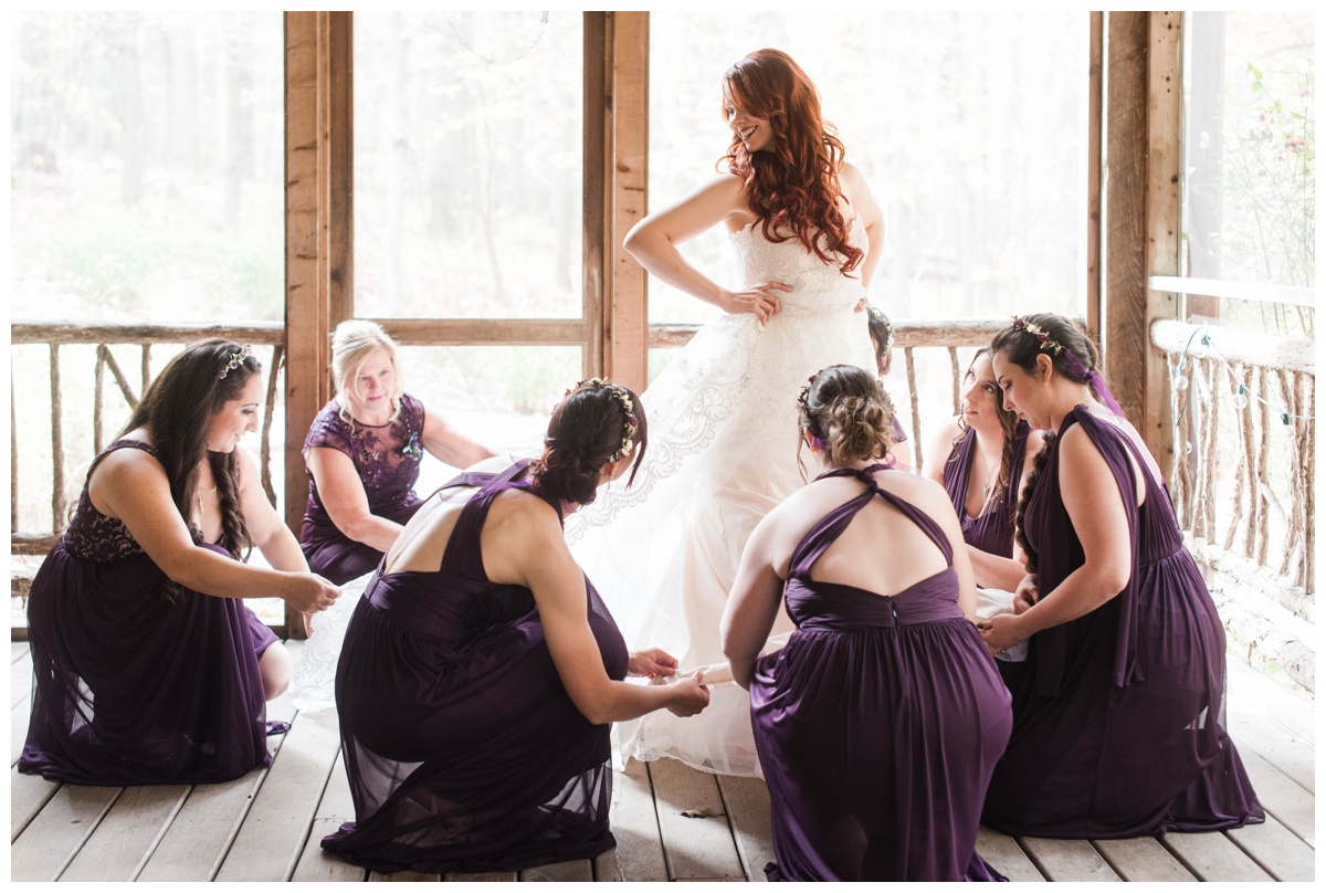 Whimsical Woodland Fall Wedding at mountain memories at thorpewood in thurmont maryland in october by sarah & dave photography richmond wedding photographer deep dark purple bridesmaid dress inspiration mother of the bride and bridesmaid helping bride get ready getting ready photo inspiration