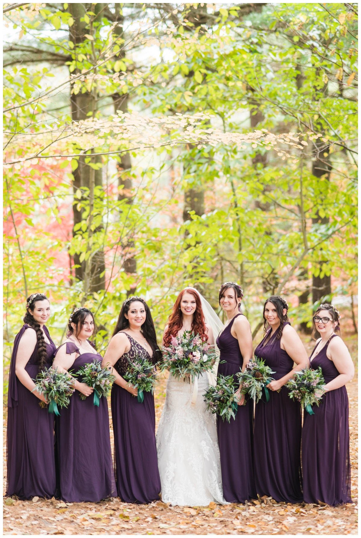Whimsical Woodland Fall Wedding at mountain memories at thorpewood in thurmont maryland in october by sarah & dave photography richmond wedding photographer deep dark purple bridesmaid dresses holding bouquet wedding party photos with bride formal portrait ideas bridal party formal portrait inspiration 