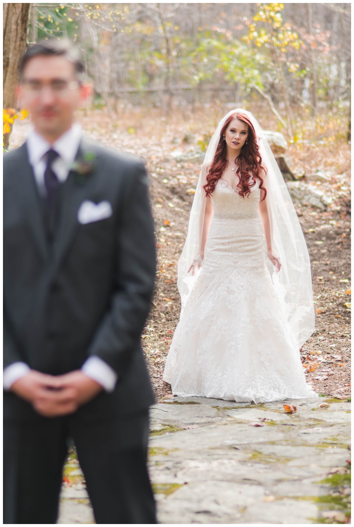 Whimsical Woodland Fall Wedding at mountain memories at thorpewood in thurmont maryland in october by sarah & dave photography richmond wedding photographer groom and bride first look photo inspiration purple tie charcoal gray black suit white wedding dress changing leaves focus on bride