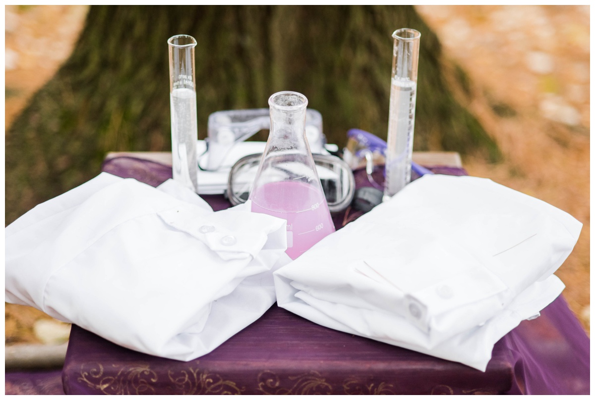 Whimsical Woodland Fall Wedding at mountain memories at thorpewood in thurmont maryland in october by sarah & dave photography richmond wedding photographer forest inspired outdoor ceremony in the woods unity candle alternative unity ceremony alternative science chemisty inspired create chemistry test tubes goggles lab coats