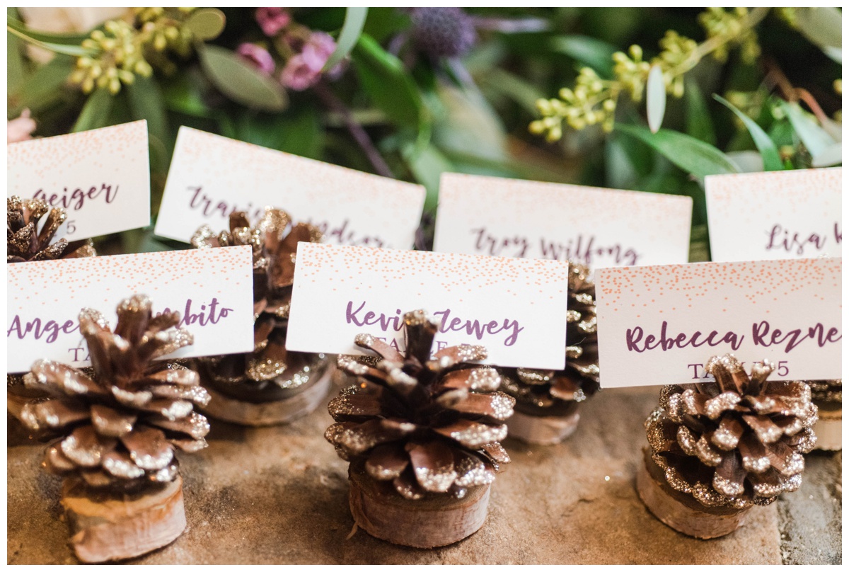 Whimsical Woodland Fall Wedding at mountain memories at thorpewood in thurmont maryland in october by sarah & dave photography richmond wedding photographer woodland forest inspired wedding reception decorations decor drink menu gold background with wooden frame pinecone table name cards