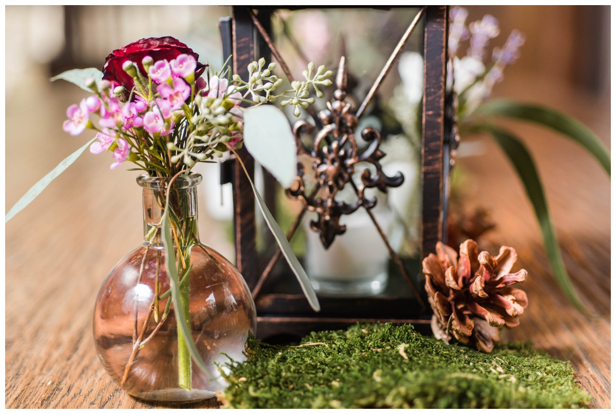 Whimsical Woodland Fall Wedding at mountain memories at thorpewood in thurmont maryland in october by sarah & dave photography richmond wedding photographer woodland forest inspired wedding reception decorations decor lantern pinecone table centerpiece wedding flower arrangement