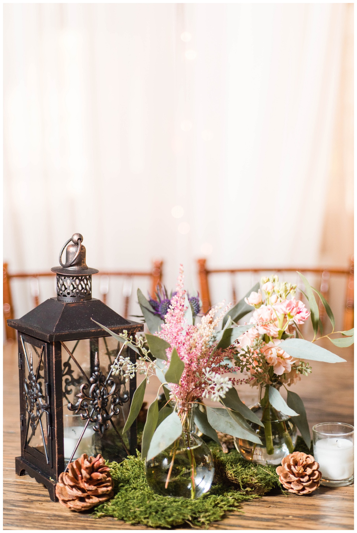 Whimsical Woodland Fall Wedding at mountain memories at thorpewood in thurmont maryland in october by sarah & dave photography richmond wedding photographer woodland forest inspired wedding reception decorations decor lantern pinecone table centerpiece wedding flower arrangement
