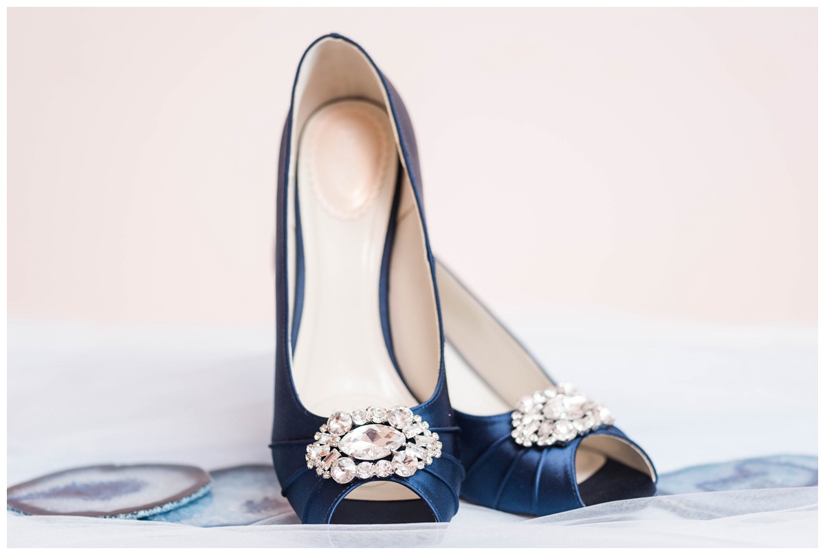 shades of blue wedding inspiration at quirk hotel in richmond virginia by rva wedding photographer sarah & dave photography blue jeweled bridal shoes with peep toe and geodes