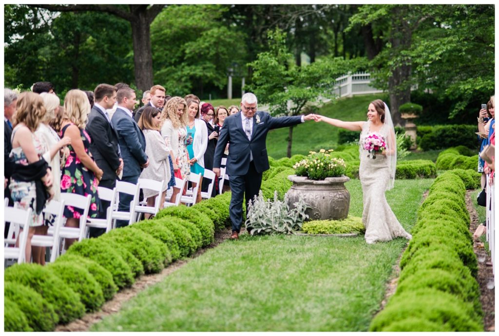 may wedding at oatlands historic house and gardens in the spring by sarah & dave photography richmond wedding photographer photo of bride and father of the bride walking down aisle