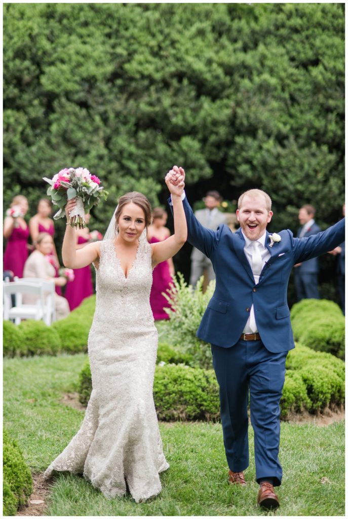 may wedding at oatlands historic house and gardens in the spring by sarah & dave photography richmond wedding photographer photo of couple walking down the aisle just married