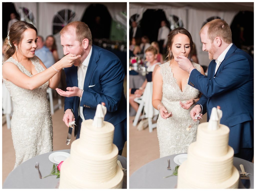 may wedding at oatlands historic house and gardens in the spring pink blue and silver wedding colors bride and groom smiling at each other by sarah and dave photography richmond wedding photographer wedding cake cutting