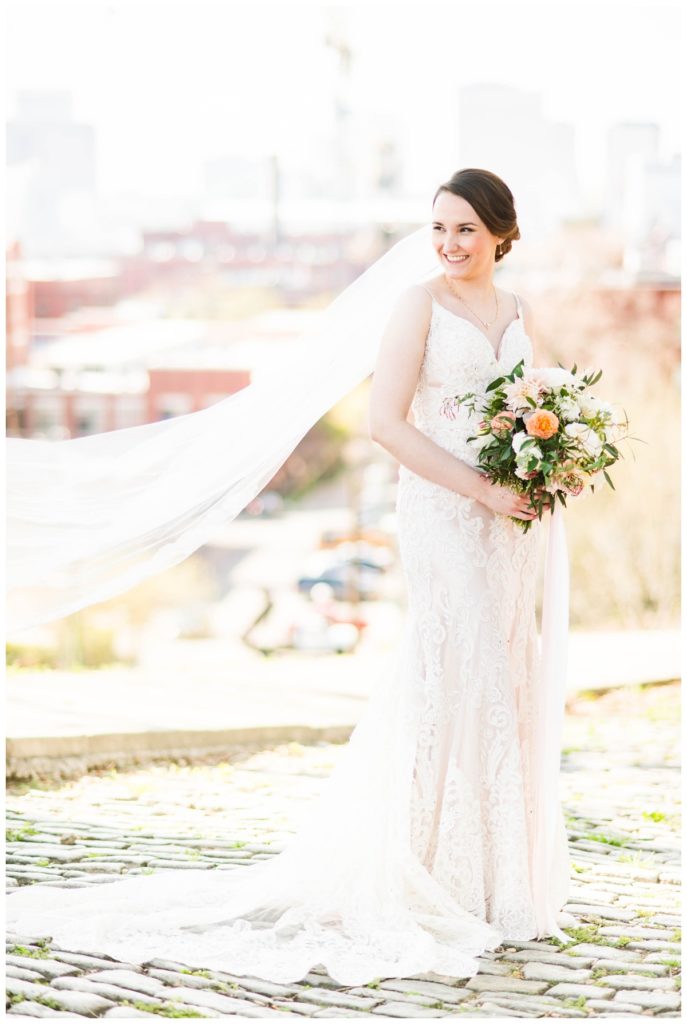 branch museum wedding in richmond va by rva wedding photographer sarah & dave photography bride outdoors holding bouquet