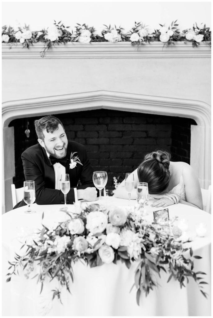 branch museum wedding in richmond va by rva wedding photographer sarah & dave photography couple laughing at sweetheart table