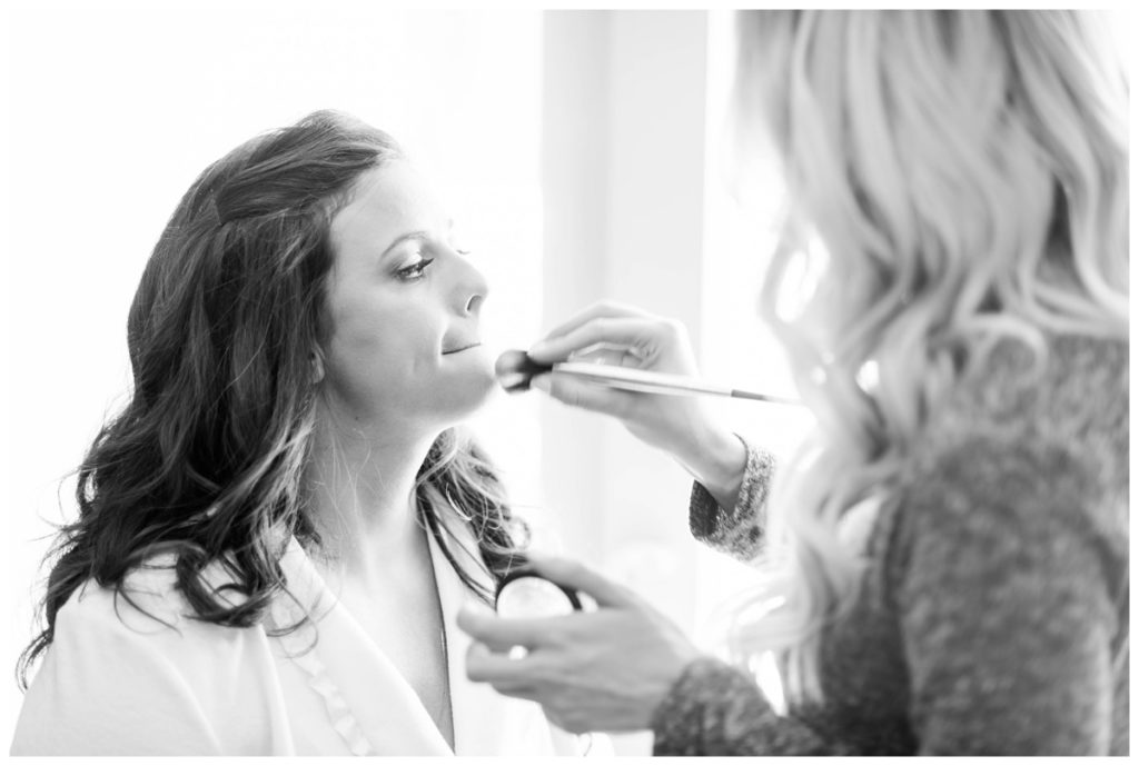 photo of maryland wedding makeup artist and bride getting ready