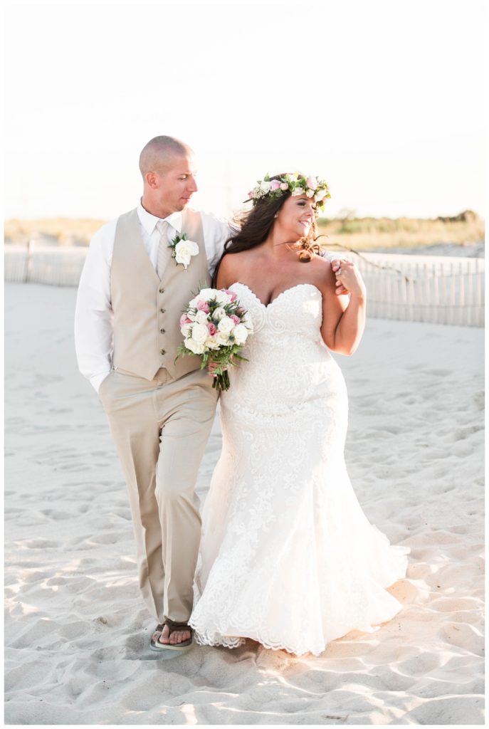 perfect summer beach wedding with romantic pink and gold wedding colors in september by destination wedding photographer Sarah & Dave Photography