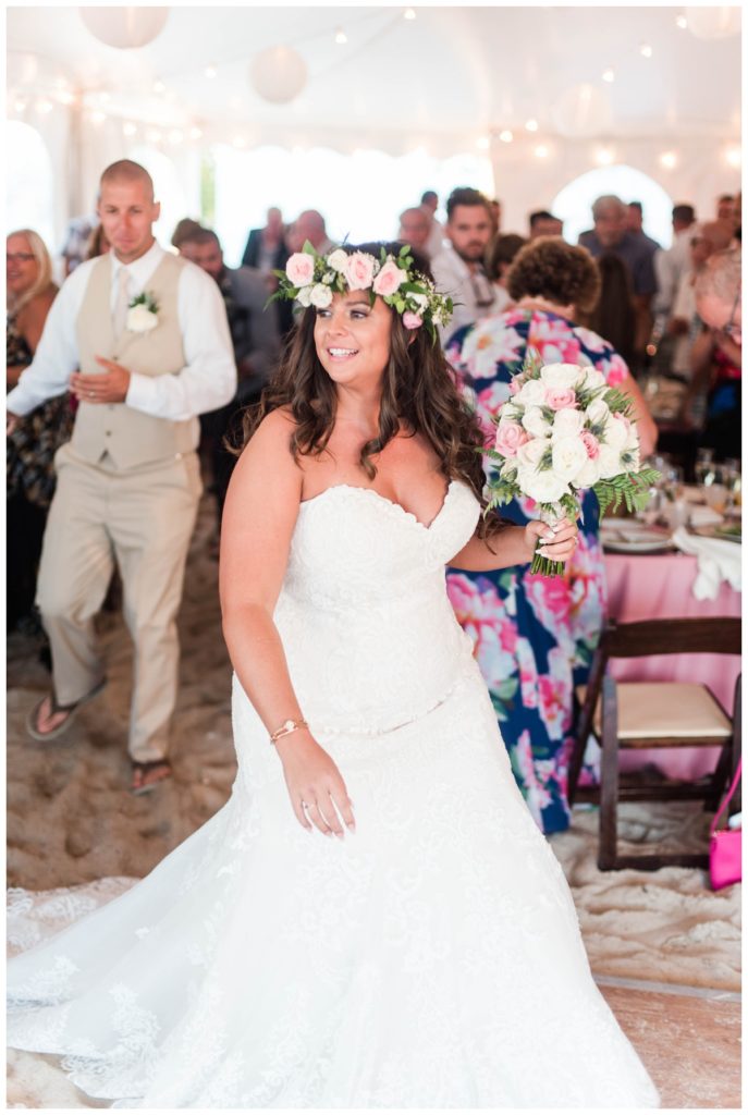 perfect pink and gold summer wedding at the beach outdoor wedding with flower crowns, sequins, tutus, pink everything, and a happy bride by beach wedding photographer Sarah & Dave Photography