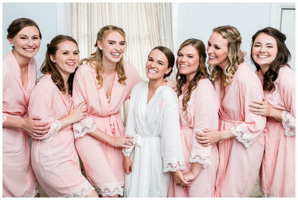 behind the scenes at this historic mankin mansion. bridesmaids and bride in pink robes.
