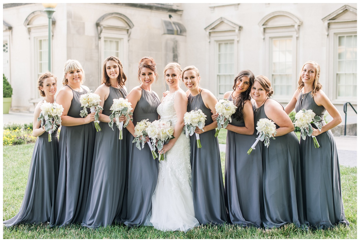 bride and wedding party formal portrait outdoors in va in june