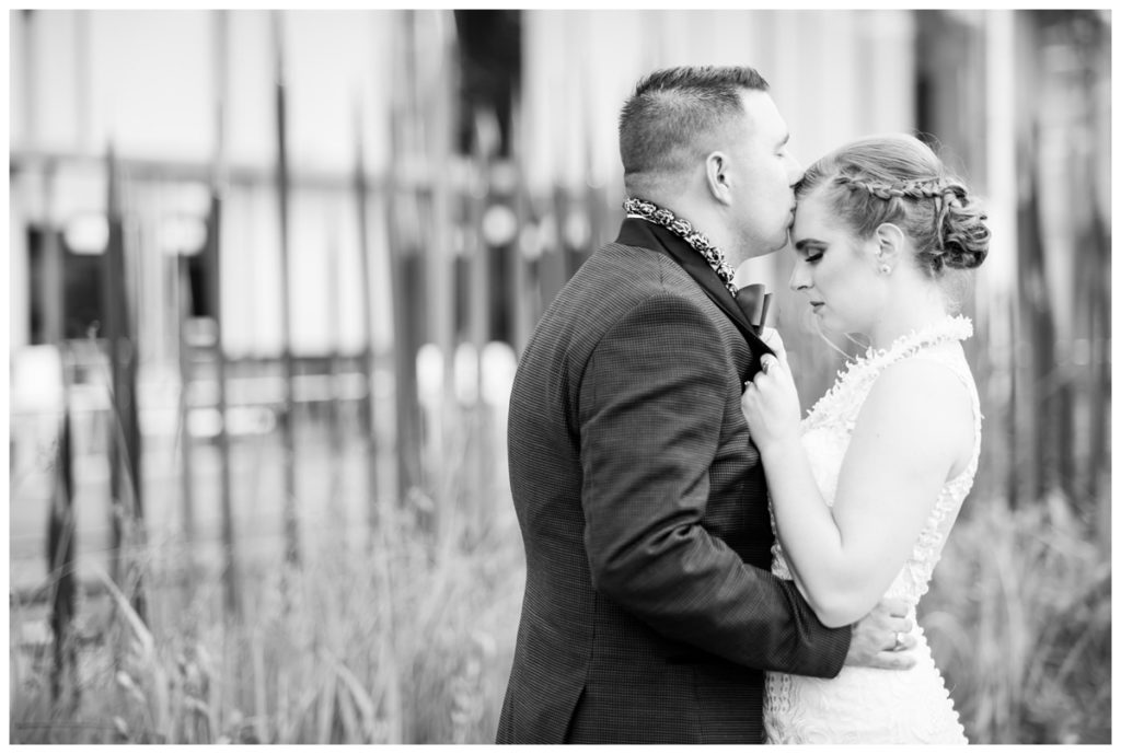 black and white wedding photo of couple outside of vmfa