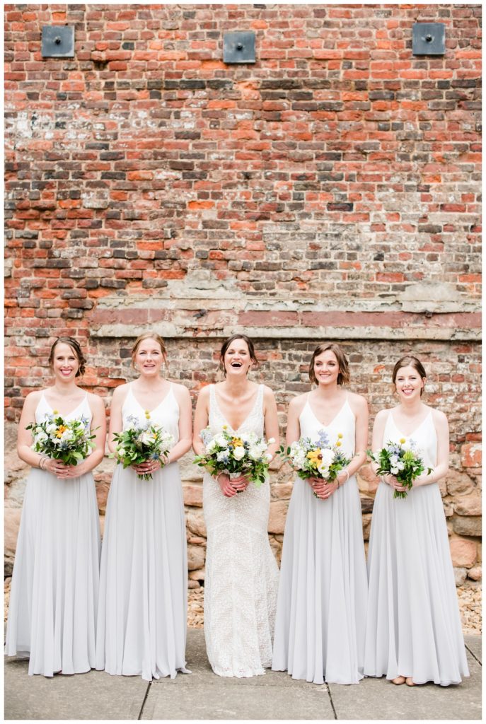 wedding party portrait at tredegar in richmond va - white and light grey revelry bridesmaid dresses were perfect for this intimate summer wedding in june