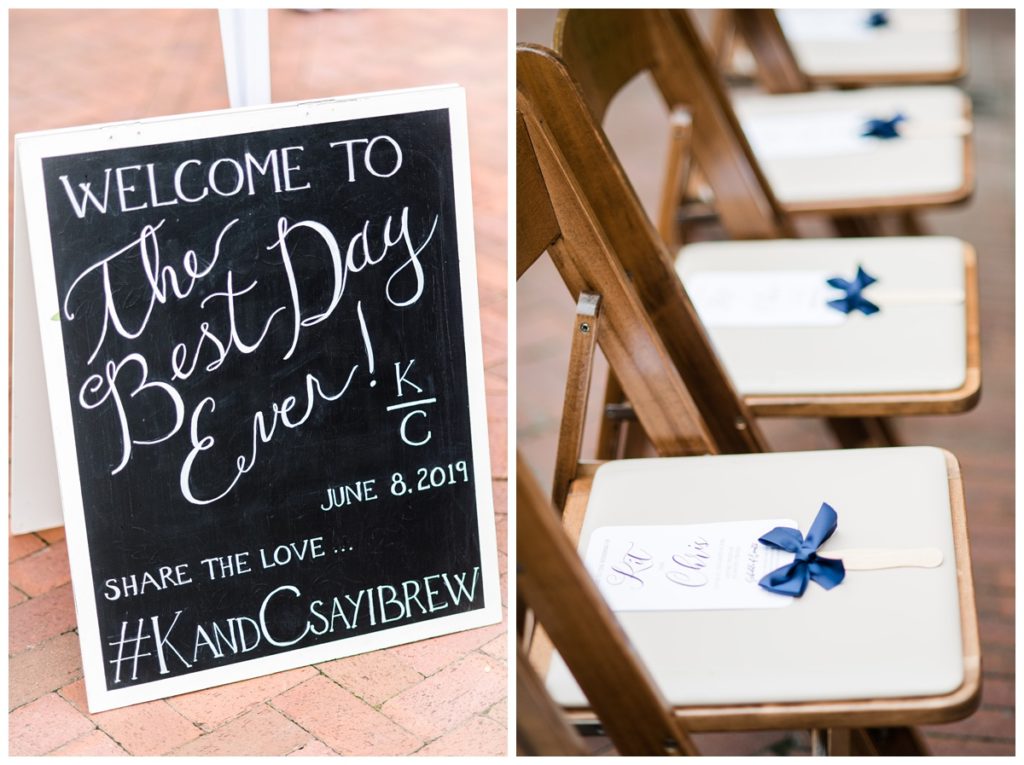wedding reception decor and details photos - welcome sign and wooden chairs with white upholstered seats and paper fan of wedding day schedule - list of events - and dark blue navy bows - super cute outdoor summer wedding decoration inspiration with so much southern charm