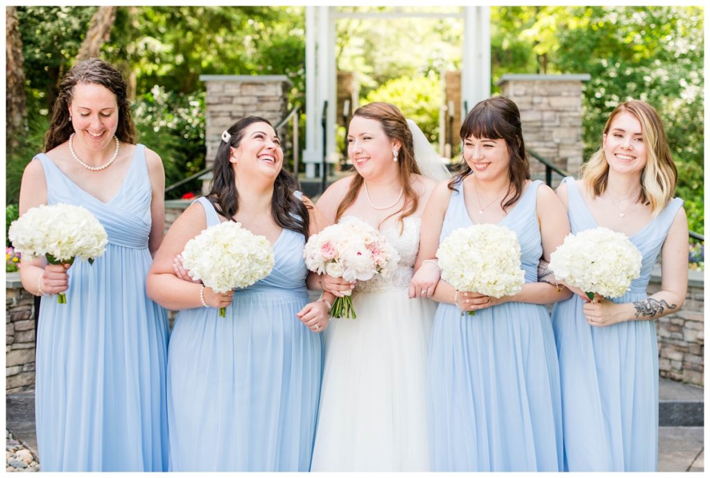happy prewedding photo of bride and wedding party bridesmaids at rva wedding venue in the summer - fairytale wedding day at the boathouse at sunday park by richmond wedding photographer sarah & dave photography
