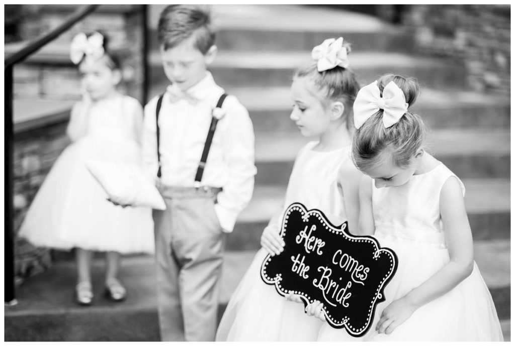 adorable flower girls and ringbearer during wedding ceremony