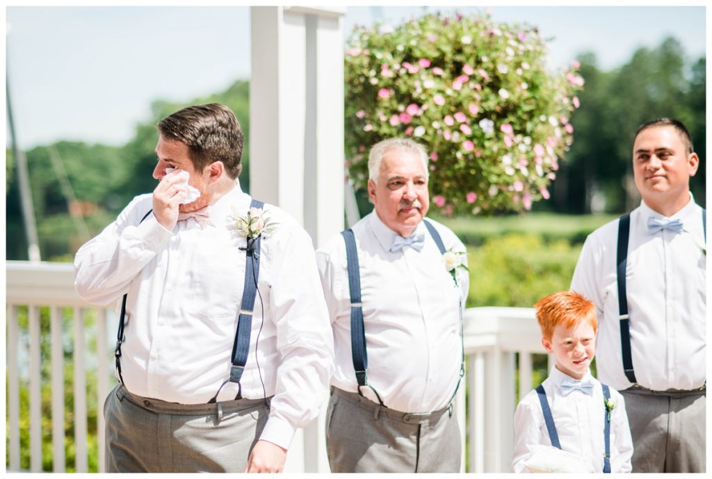 light blue bowties, navy blue suspenders, gray grey suit pants - groom and groomsmen attire - groom crying during ceremony