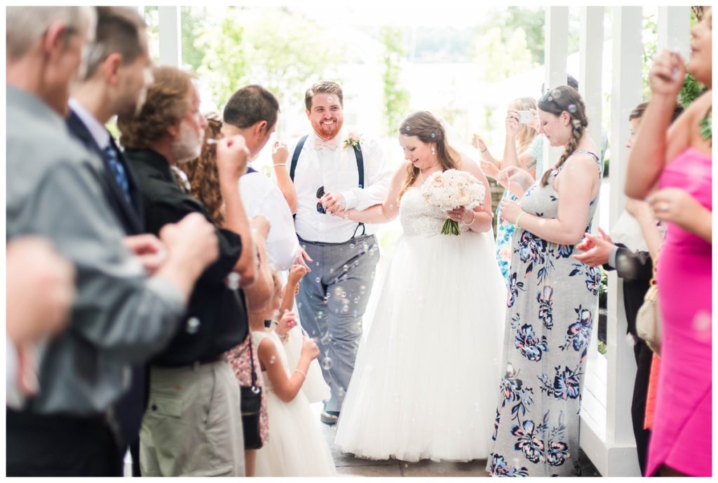 bubble exit at the boathouse at sunday park richmond wedding venue in the summer in june - fairytale wedding inspiration ideas by rva wedding photographers, sarah & dave photography