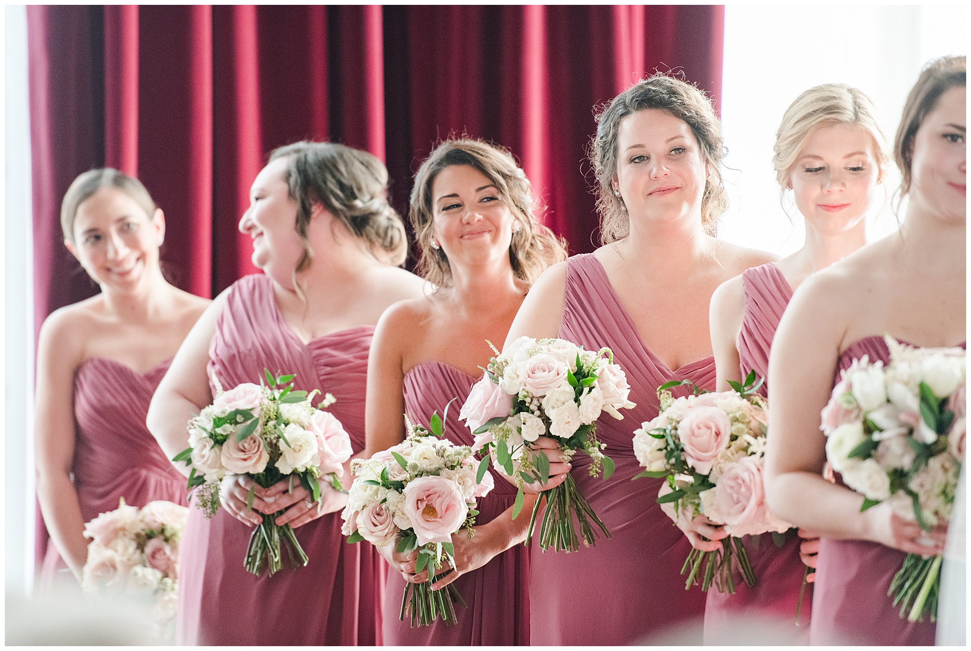 wedding ceremony in the ballroom at dover hall. bridesmaids watching bride walking down the aisle. by richmond rva wedding photographer, sarah & dave photography.
